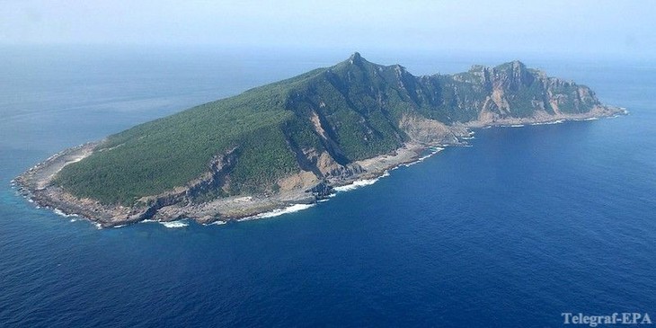 Япония обнаружила вооруженные корабли Китая вблизи спорных островов - ảnh 1